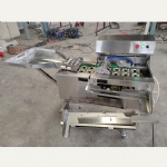 Egg breaking and separating machine