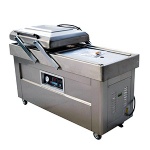 Double vacuum sealing machine